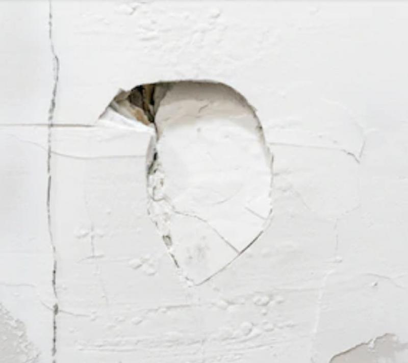 Repairing Holes Through Plaster Walls - 2 Methods