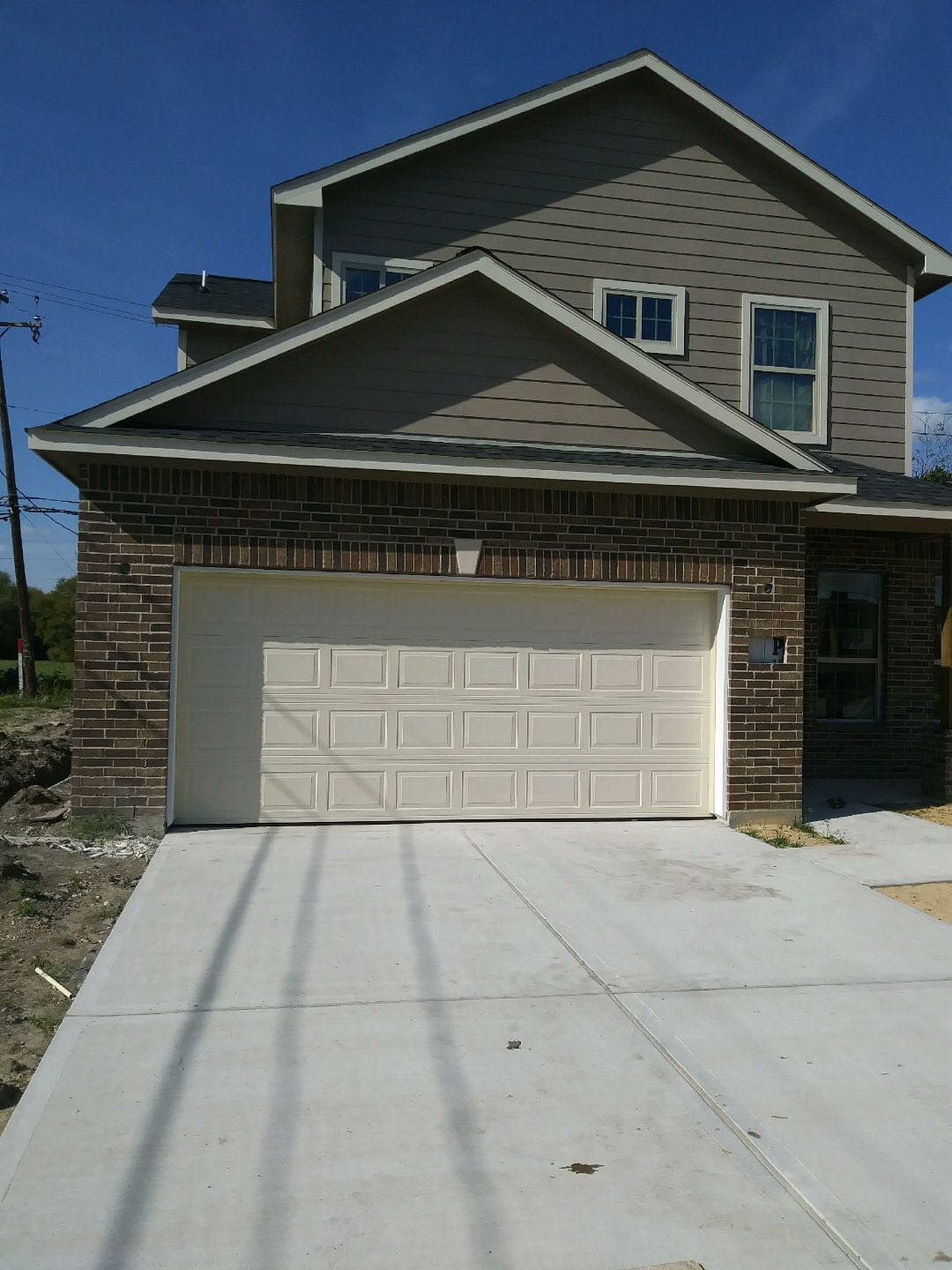 Residential garage doors attached to the home