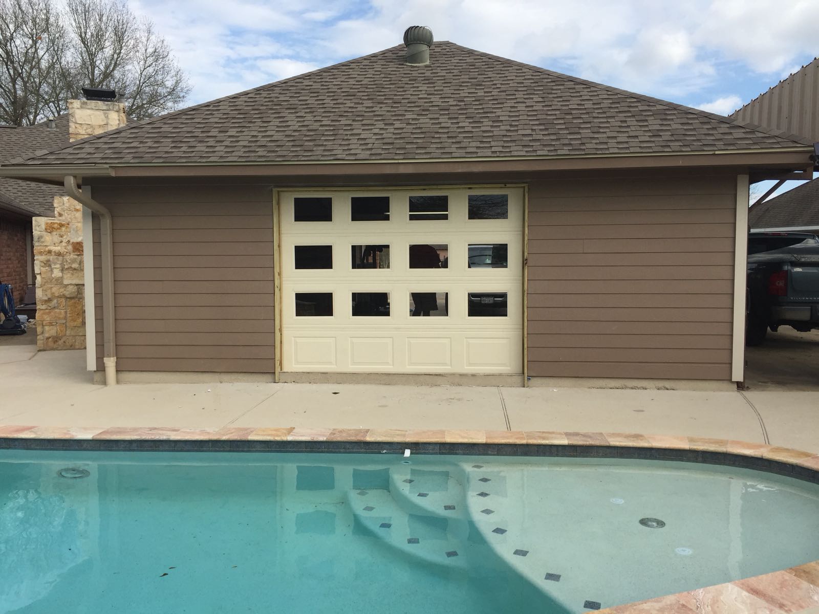 glass door facing a pool